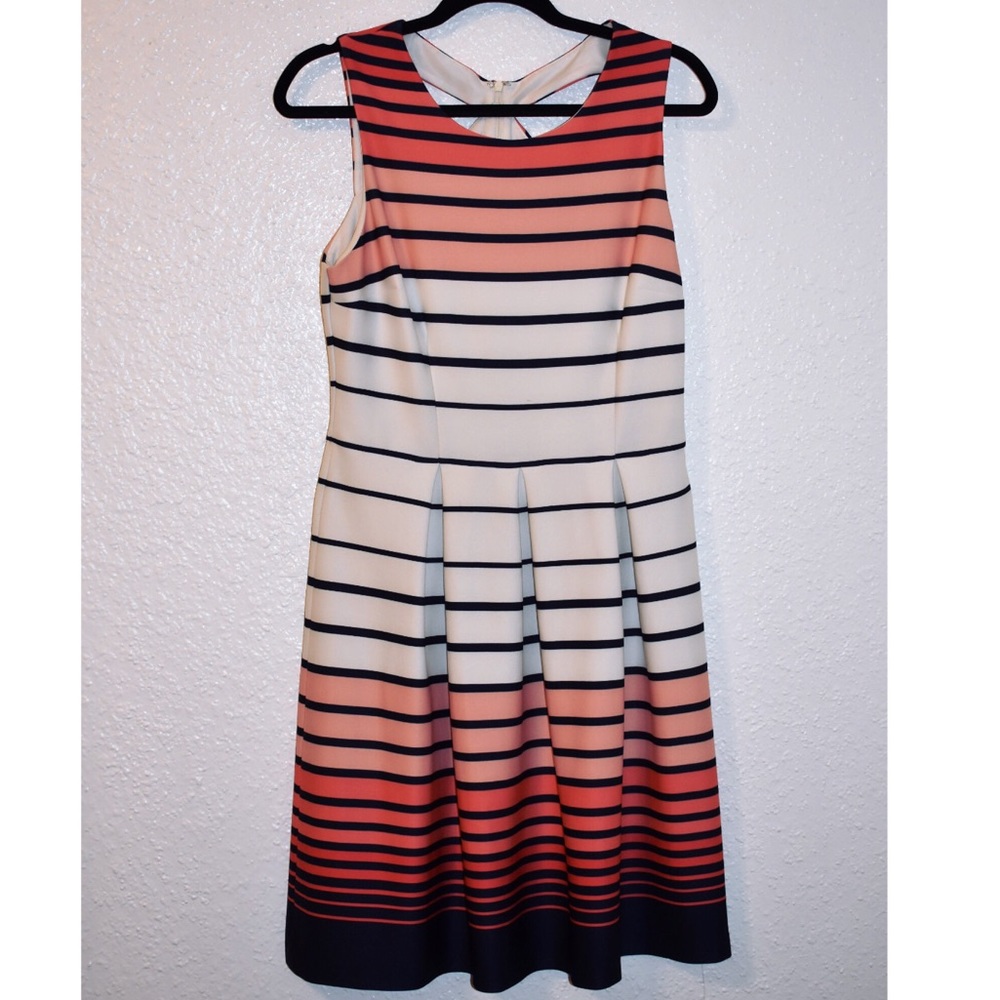 Sun dress with geometric cutouts